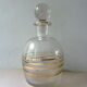 Pair of glass whiskey decanters with gold edging