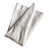 Round white embroidered cotton tablecloth