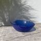 Blue glass shell emptier