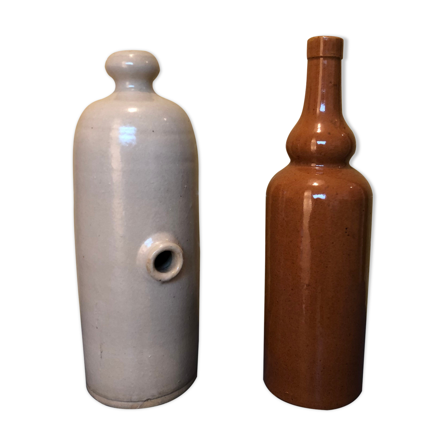 Duo of sandstone bottles