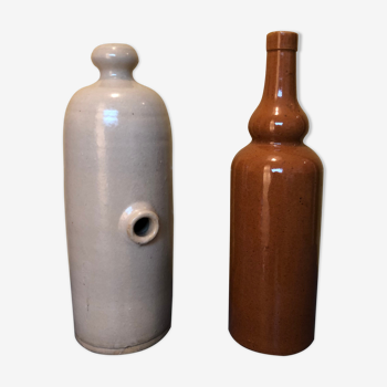 Duo of sandstone bottles