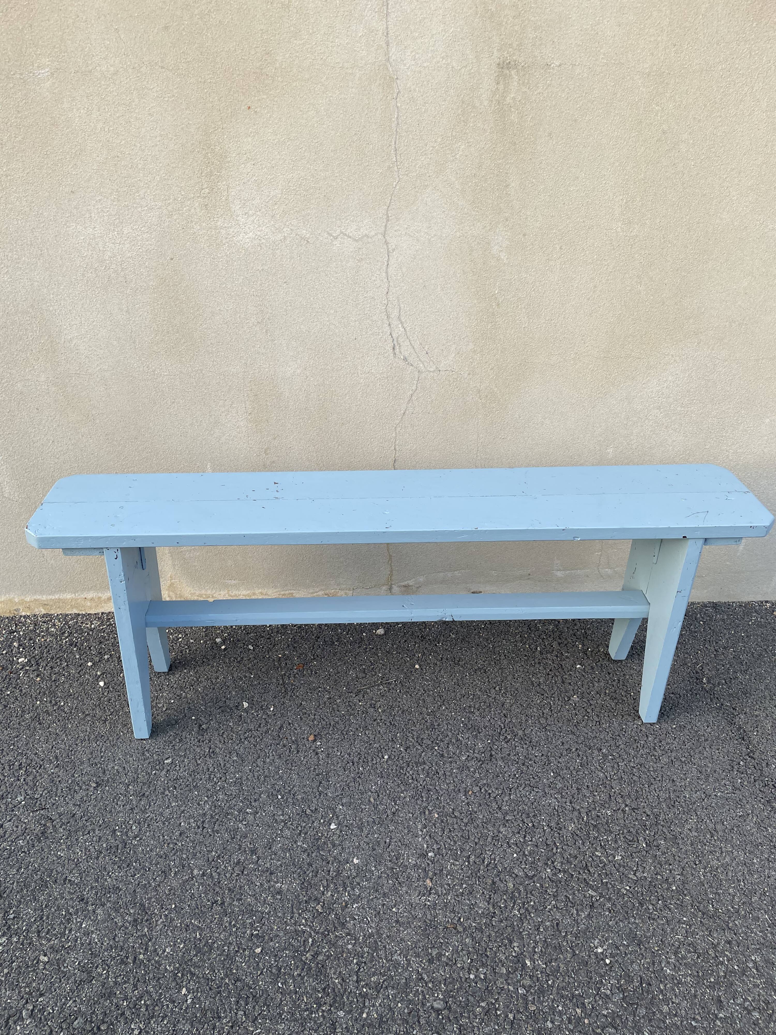 Blue painted wooden bench
