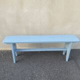 Blue painted wooden bench