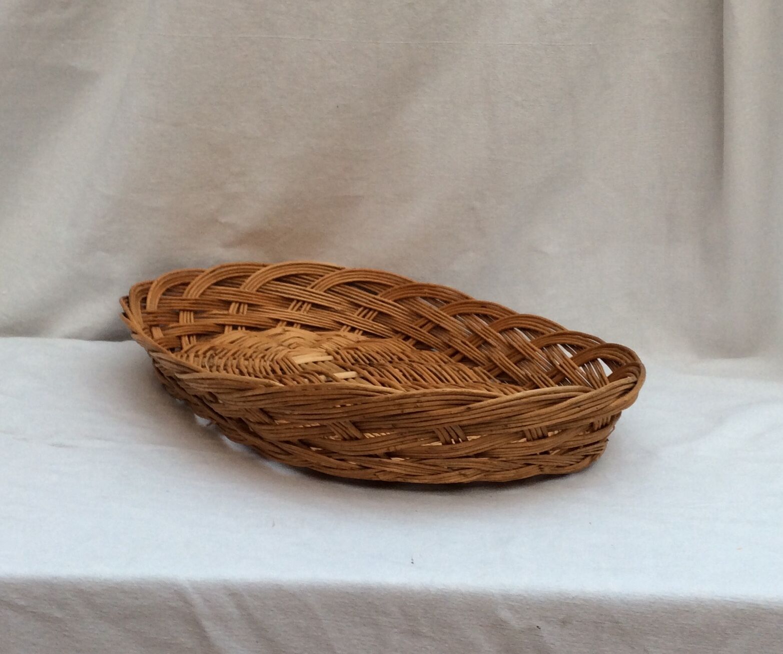 Vintage oval-shaped wicker basket
