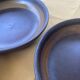 Organic earthenware deep plates from Gré du Marais, France.