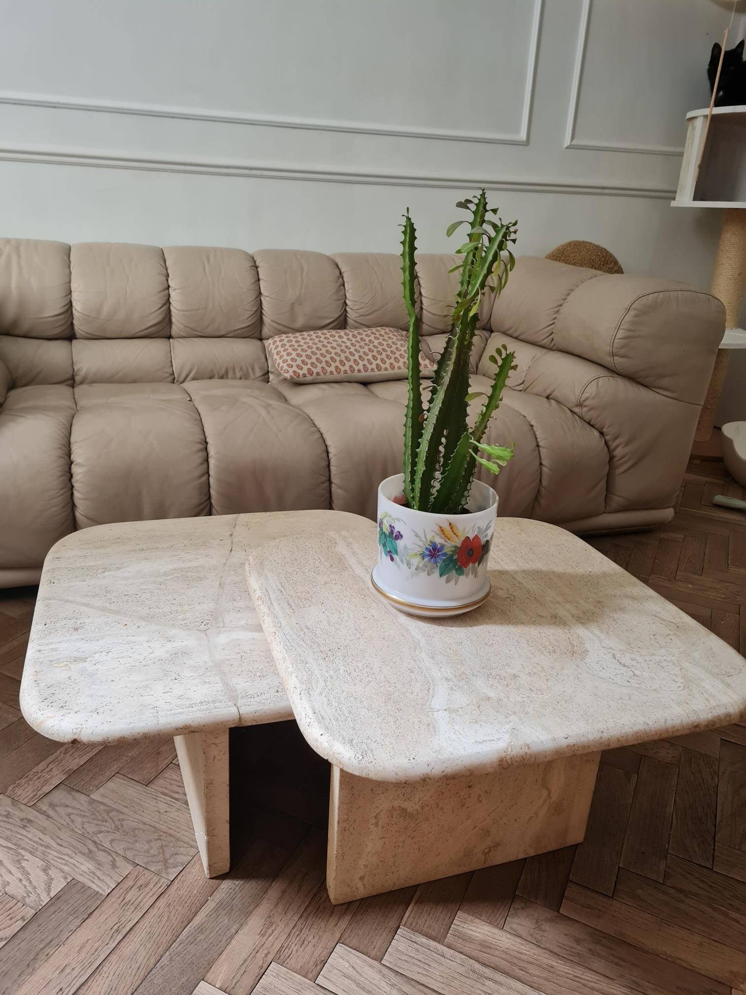 Pair of travertine nesting tables