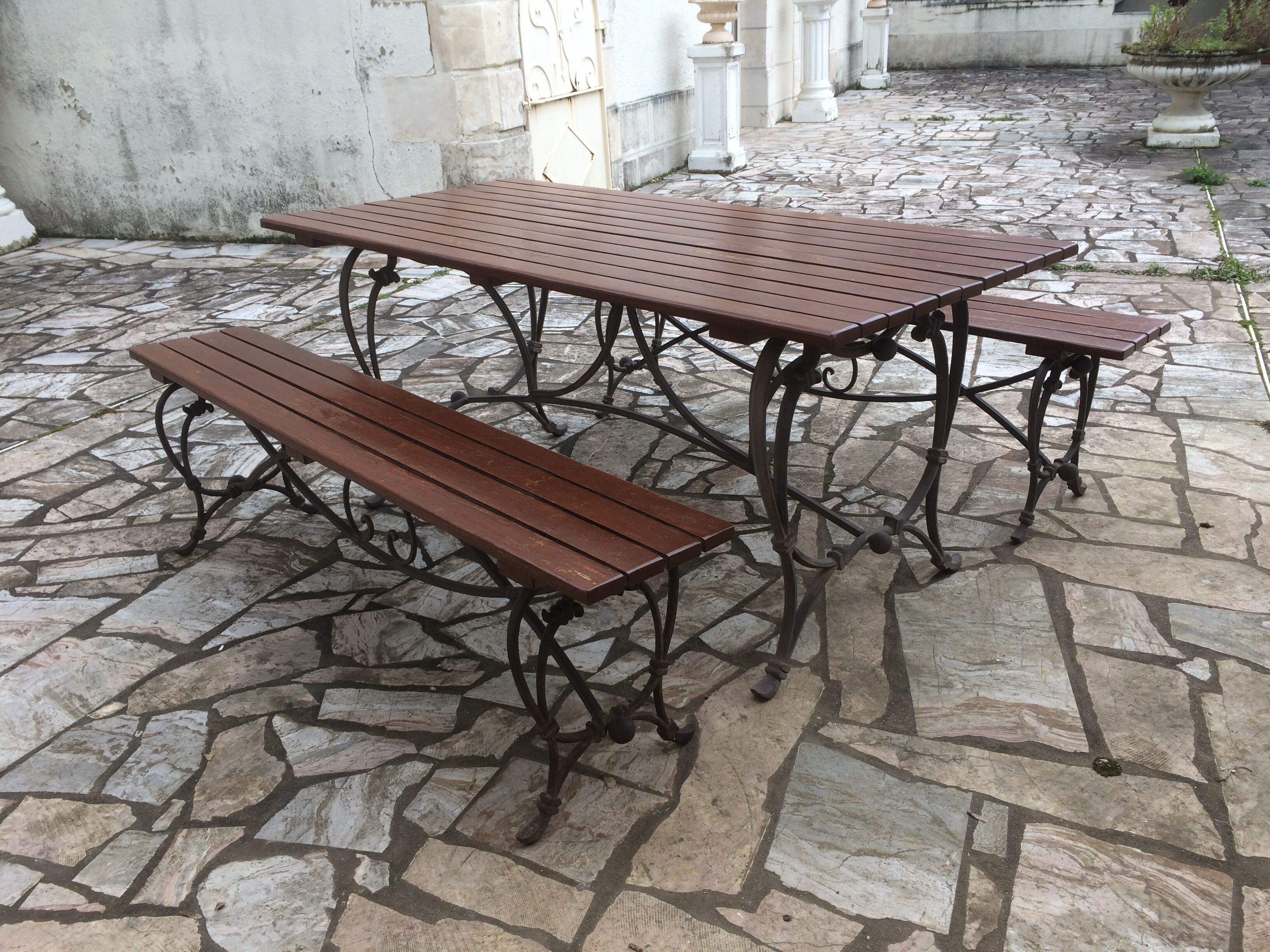 Garden lounge table and 2 cast iron and oak benches