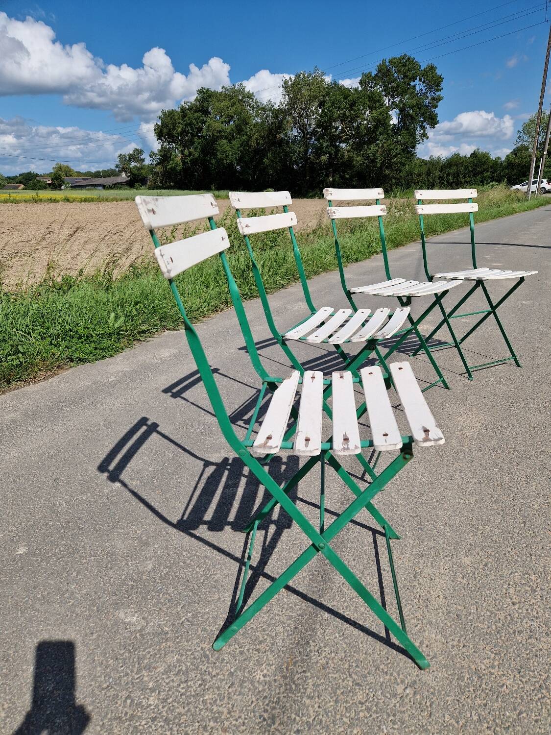 Set of 4 folding wrought iron bistro chairs