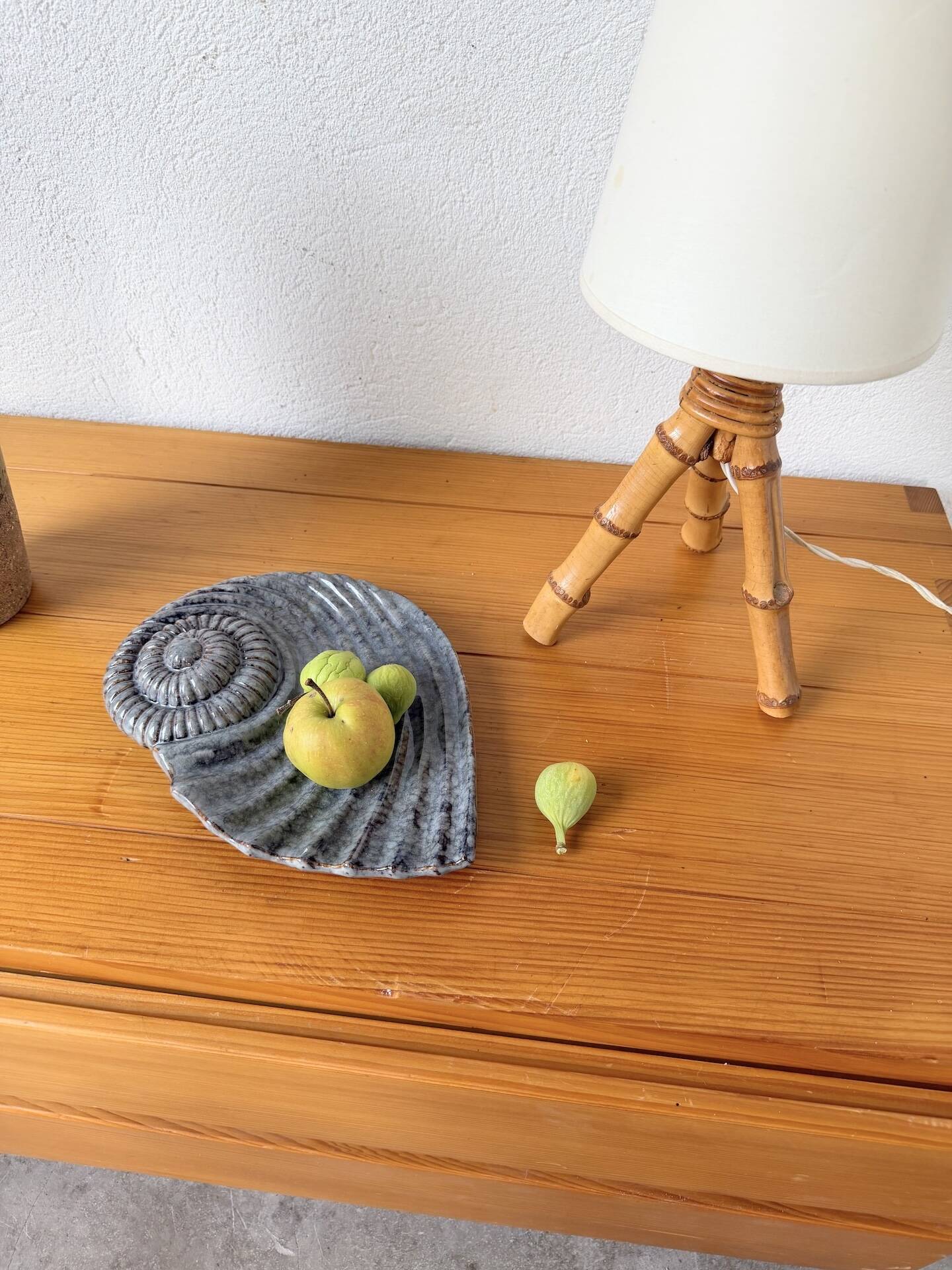 Shell-shaped ceramic catchall.