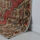 Vintage Turkish rug in beige and red with oriental design, 135 × 210 cm