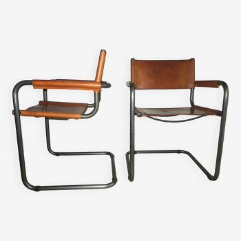 Pair of cantilever chairs in zinc-plated tubular steel and patinated cognac leather