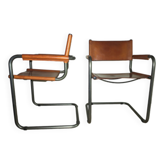 Pair of cantilever chairs in zinc-plated tubular steel and patinated cognac leather