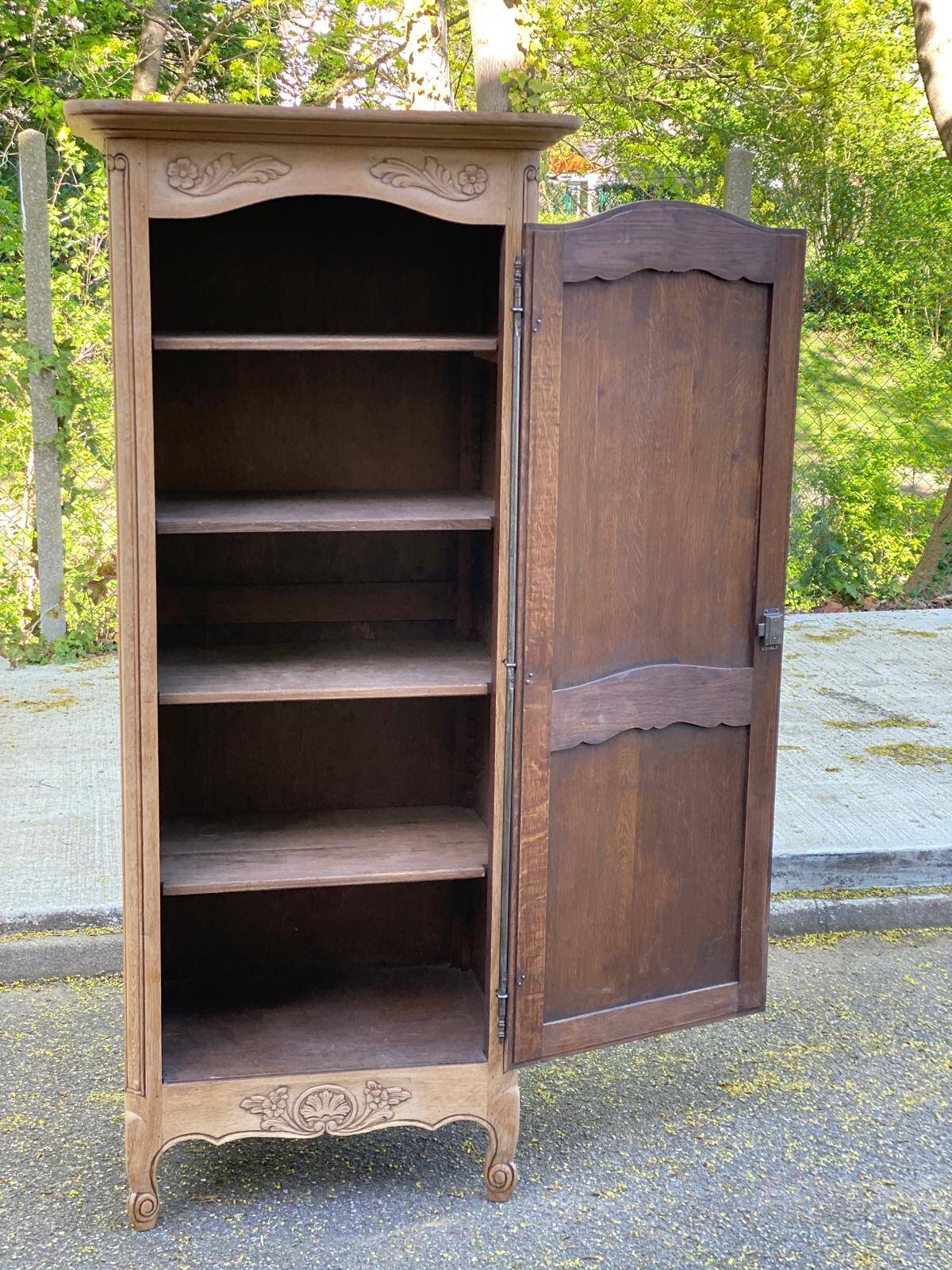 Renovated Louis XV bonnetière dormitory wardrobe in solid oak.
