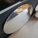 Antique oval mirror with chiseled edges