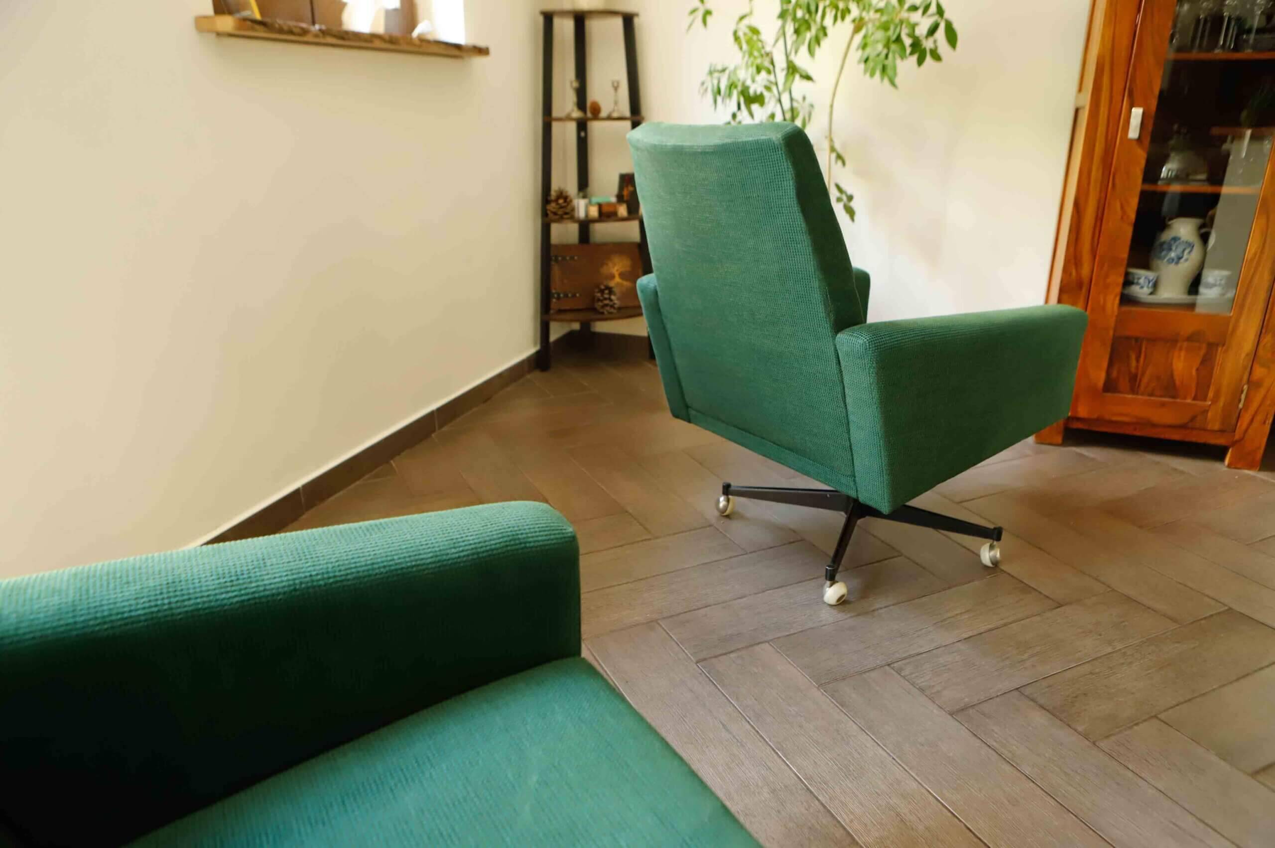 Pair of retro swivel chairs on casters