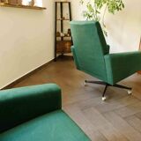 Pair of retro swivel chairs on casters