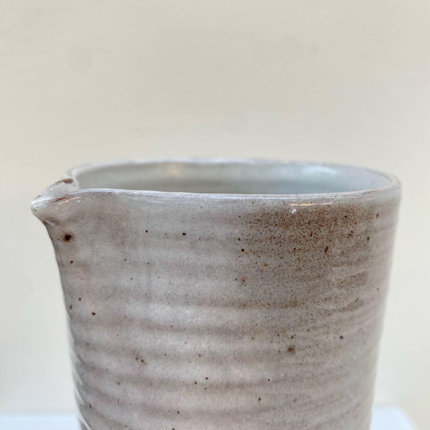 Enameled stoneware pitcher by Jeanne and Norbert Pierlot