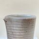 Enameled stoneware pitcher by Jeanne and Norbert Pierlot