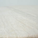 Round Belgian travertine dining table