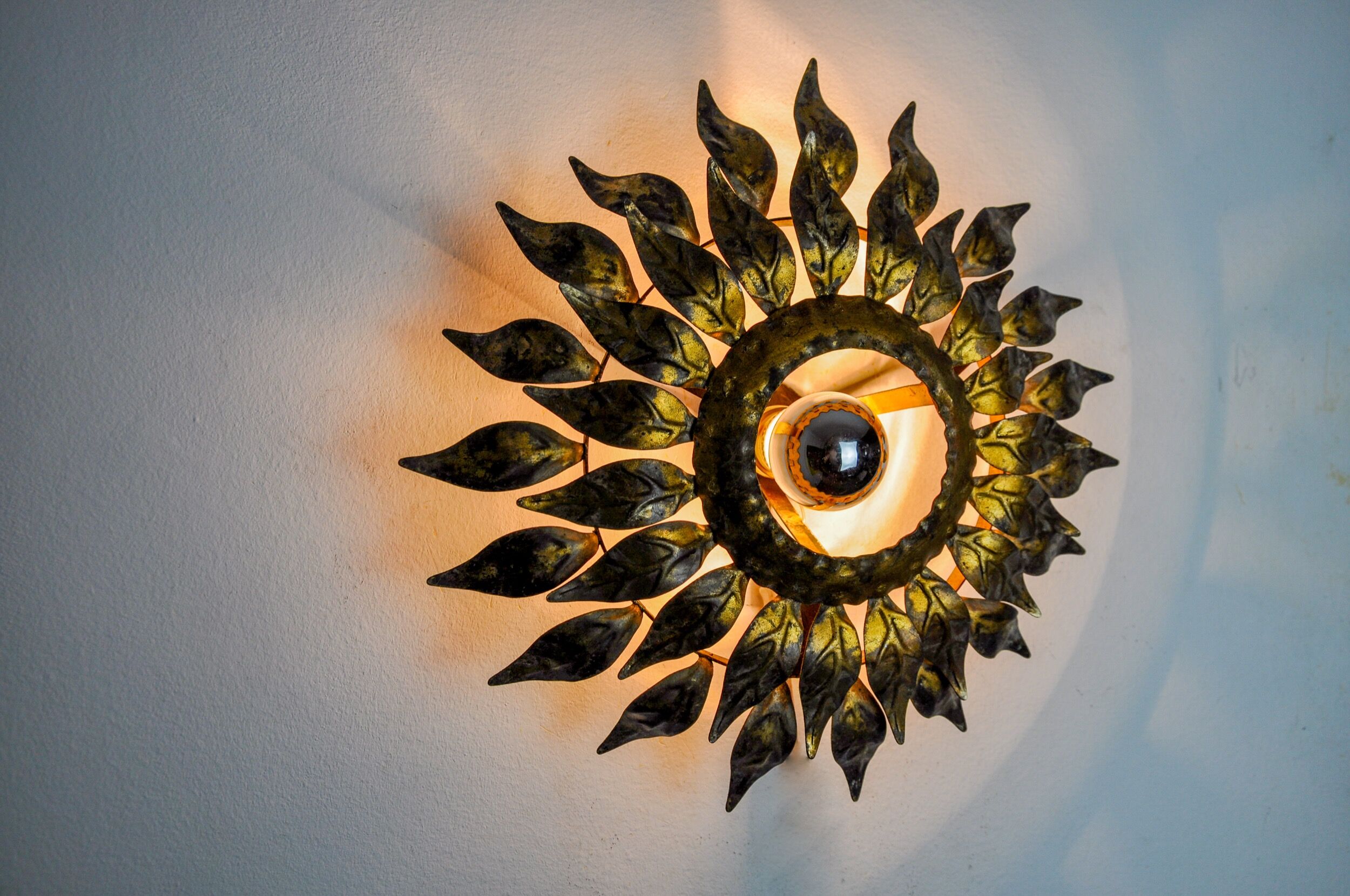 Sun wall lamp by ferro arte, metal and gold leaf, Spain, 1960