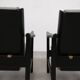 2x wooden Scandinavian arm chairs