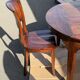 Round teak table 150 cm with 6 Indonesian chairs.