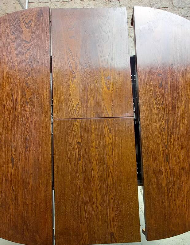 Vintage round extendable wooden table.