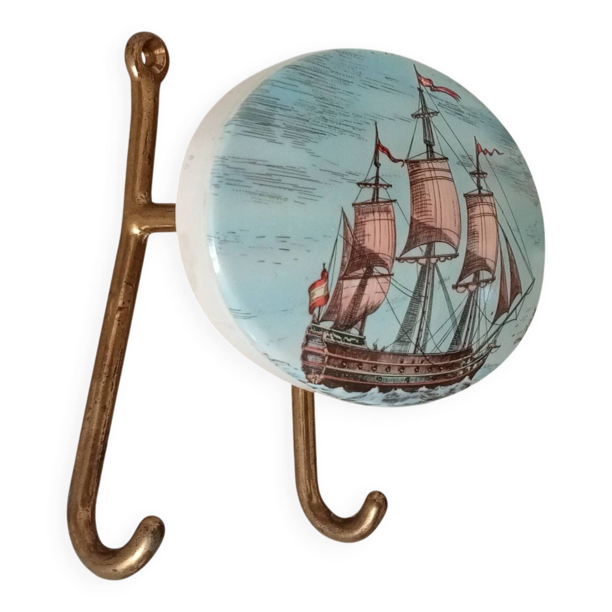 Vintage wall coat hook in brass and Bakelite.