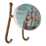 Vintage wall coat hook in brass and Bakelite.