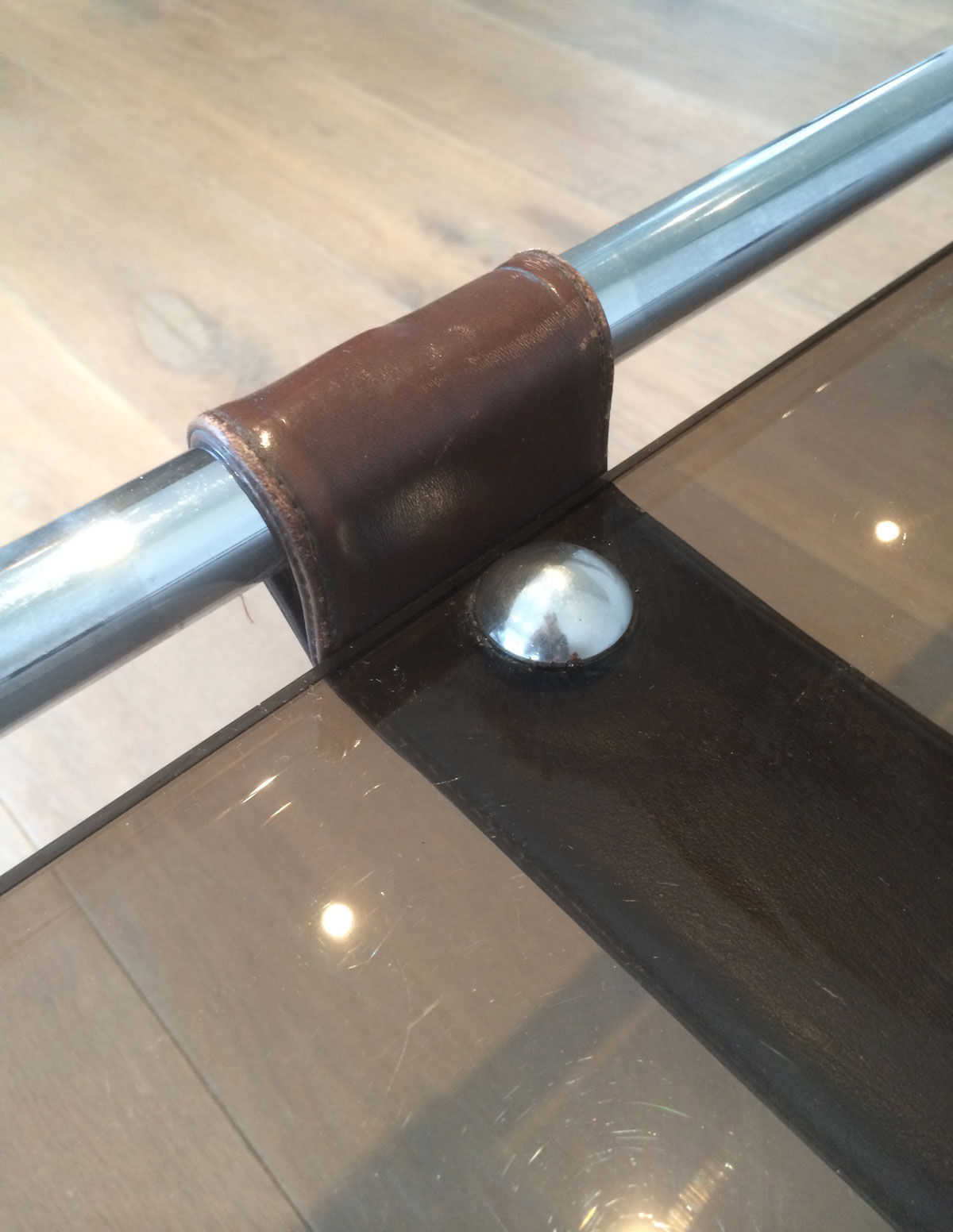 Coffee table in chrome, leather and smoked glass