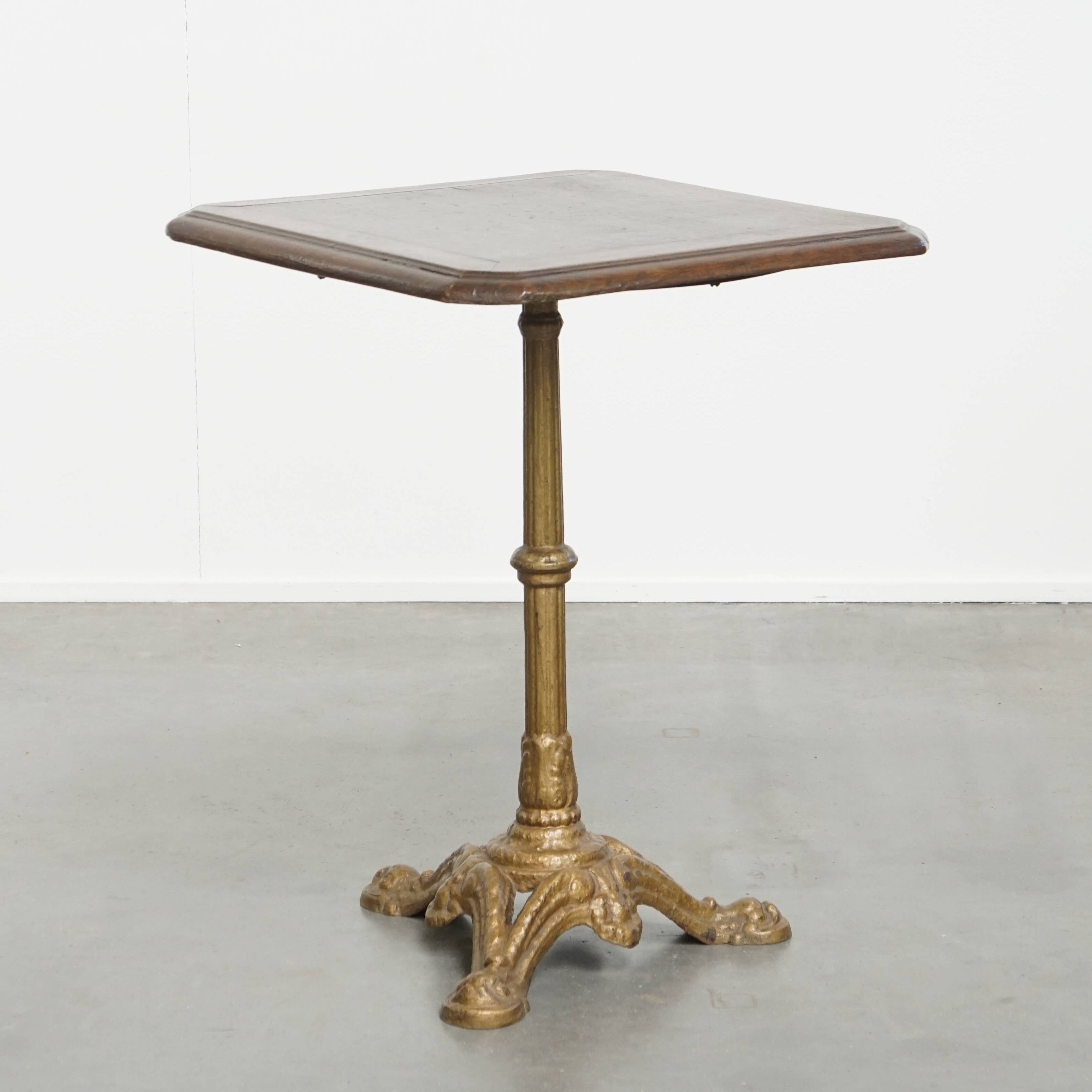 Antique Bistro Table with Gold-Colored Cast Iron Base and Dark Oak Top