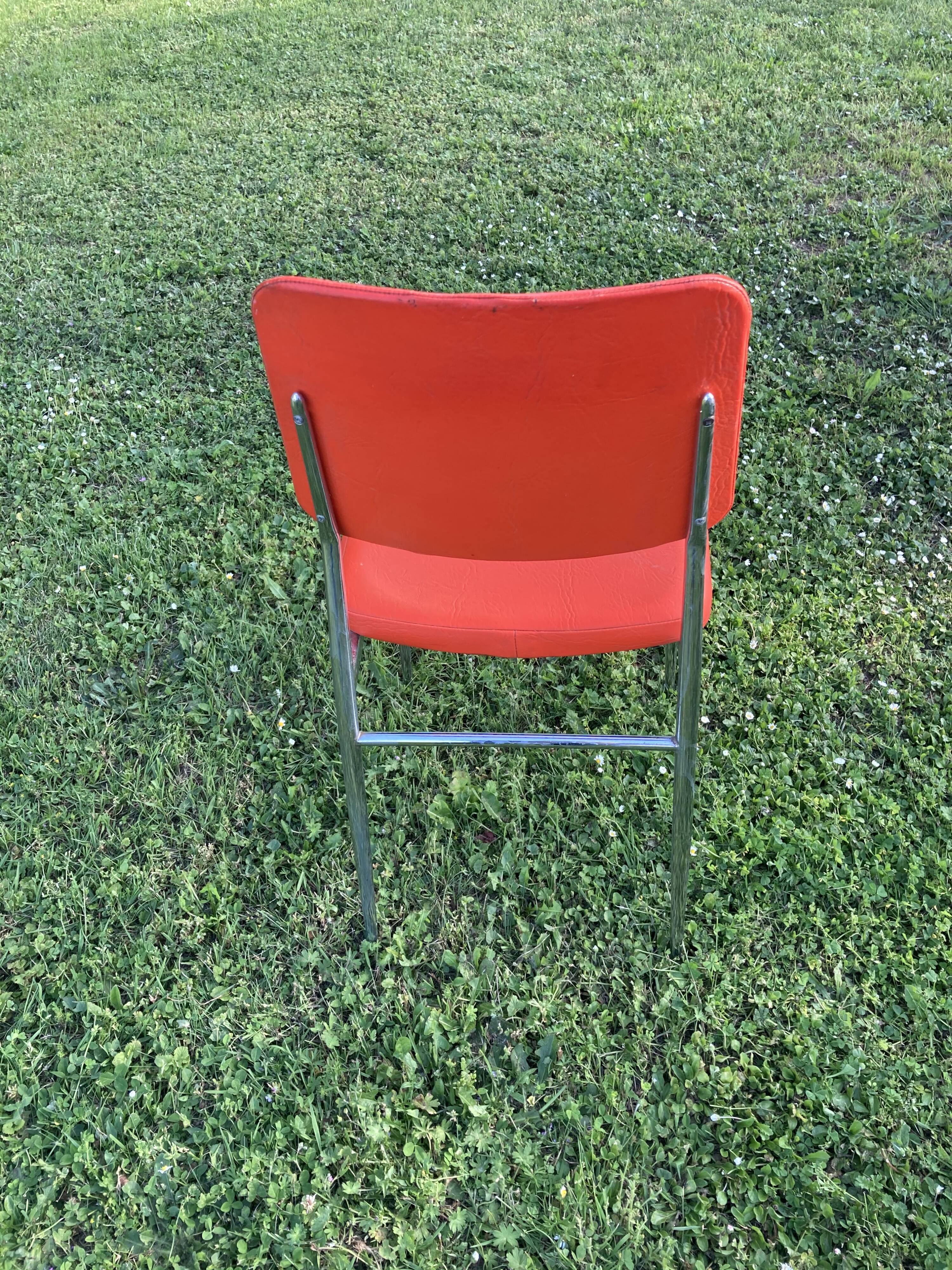 Series of 4 vintage orange chairs