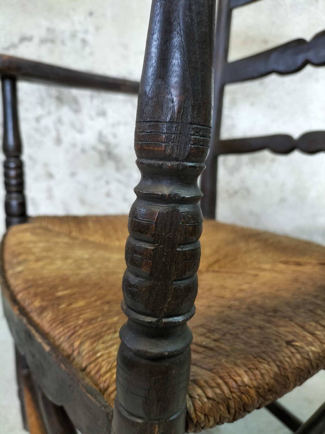 High back straw armchair