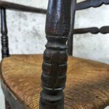 High back straw armchair