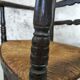 High back straw armchair