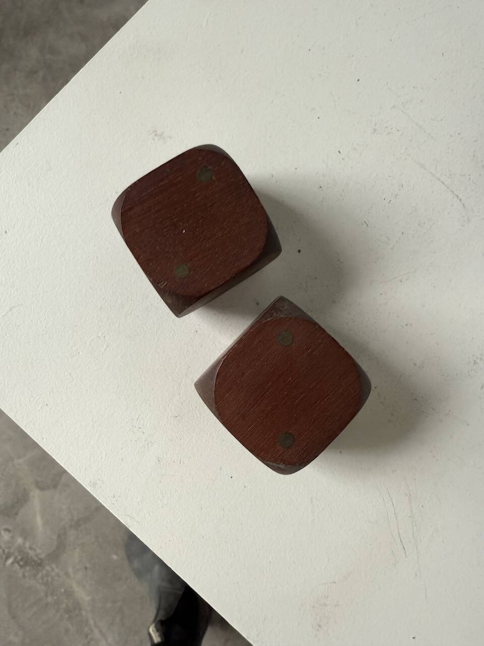 Pair of 1960s teak and brass "dice" candlesticks