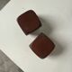 Pair of 1960s teak and brass "dice" candlesticks