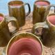 Set of 5 brown stoneware mugs