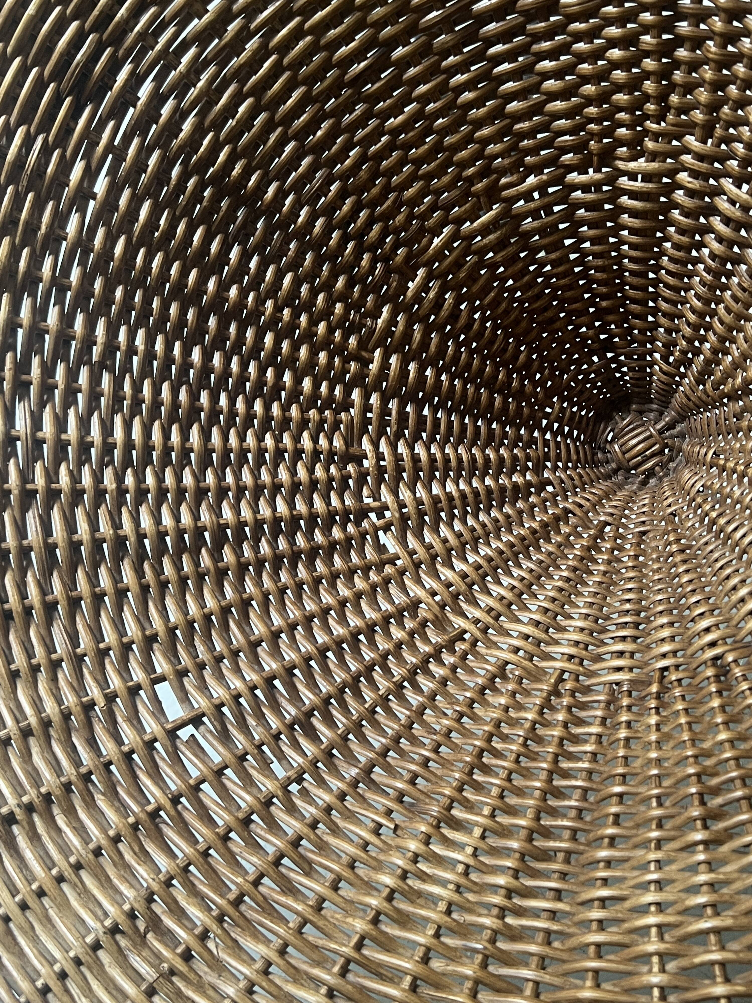 Italian sunflowers armchair in rattan and black metal, 1950s design.