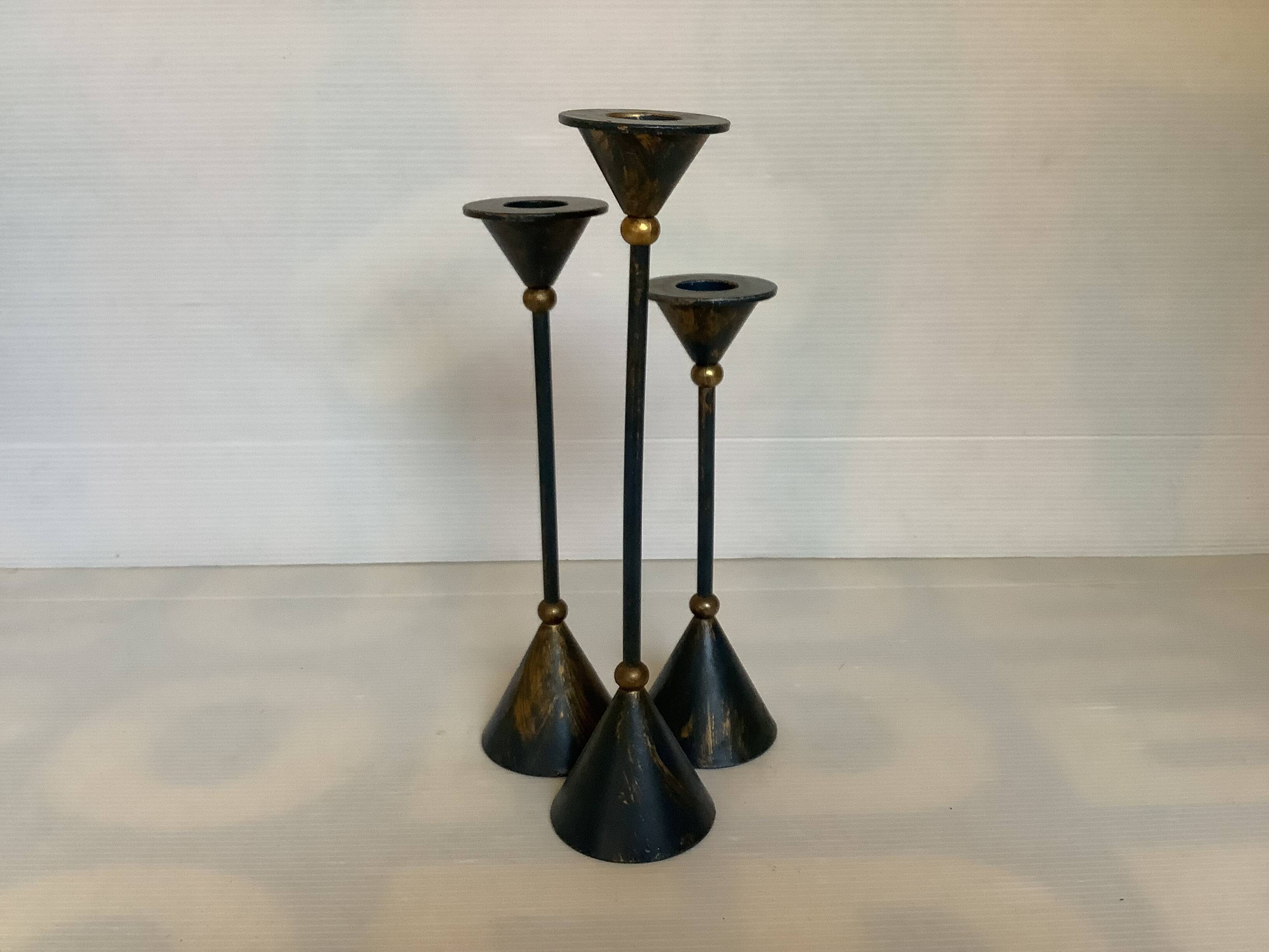 Trio of vintage blue and gold candlesticks