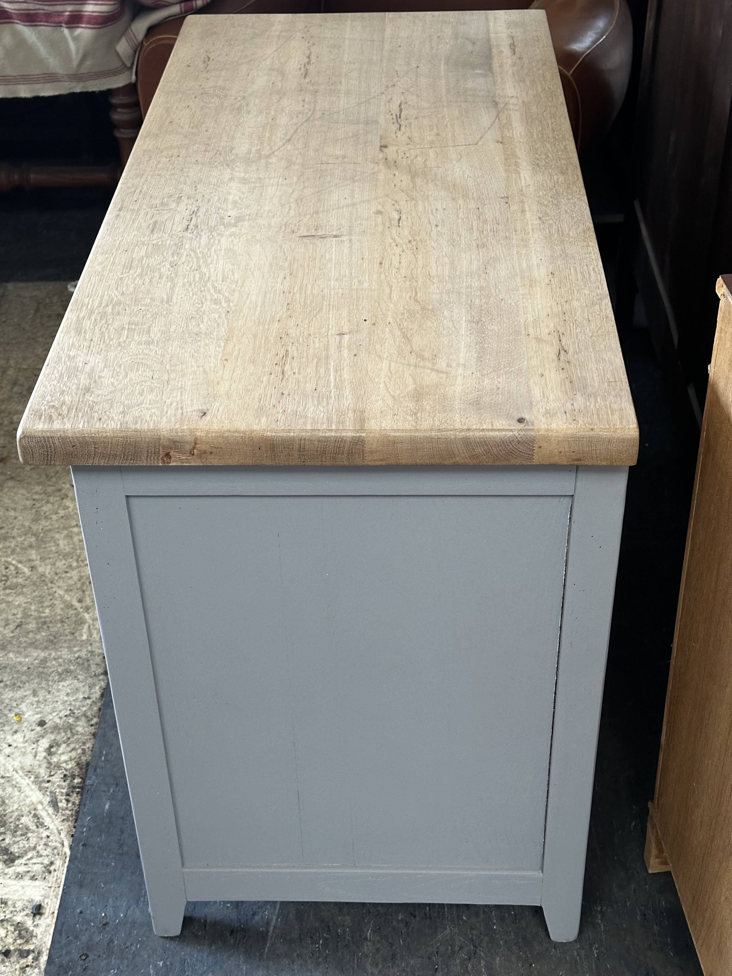 Vintage sideboard painted in gray and raw wood