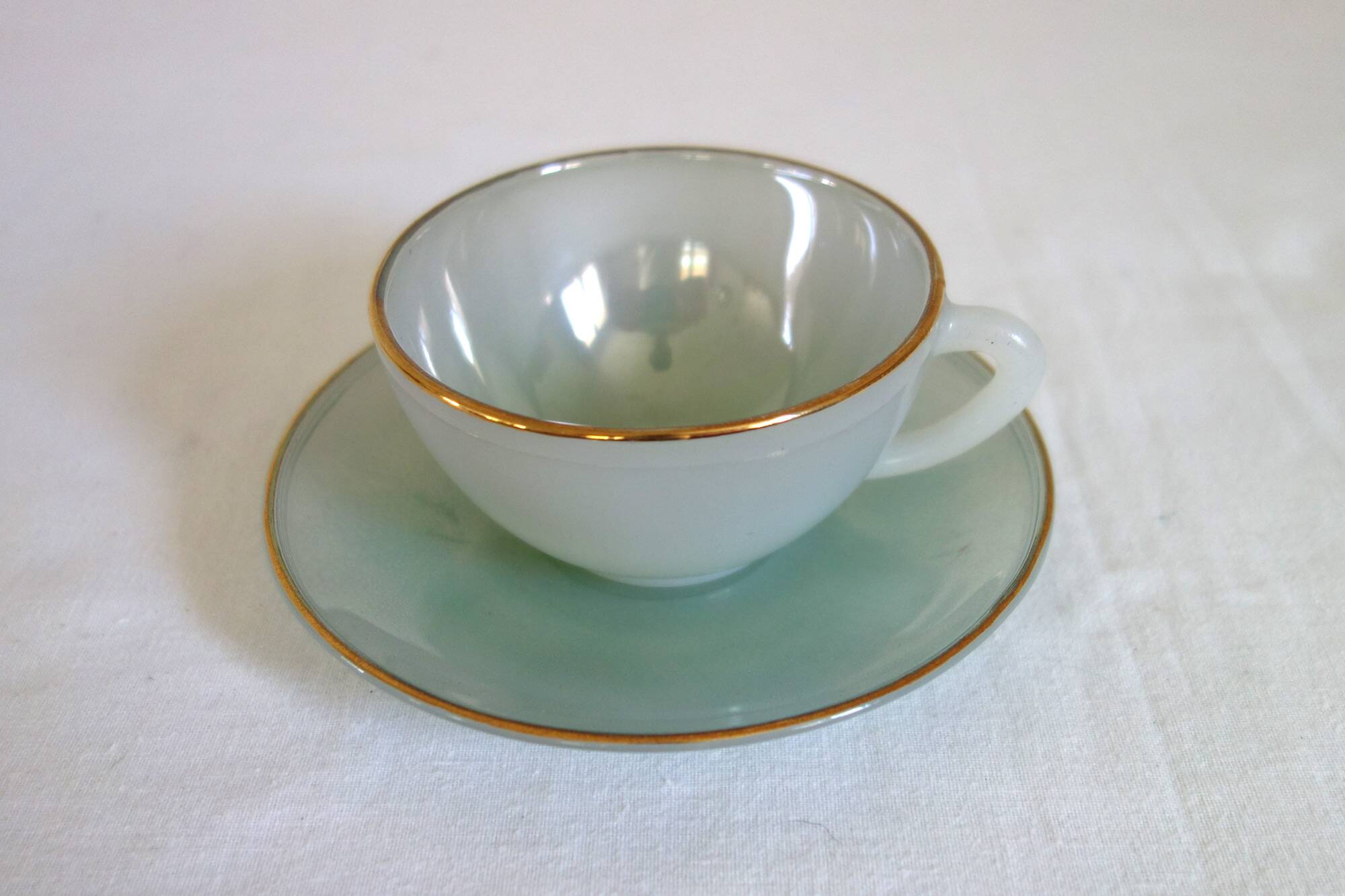5 vintage Arcopal Harlequin teacups with saucers