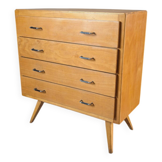 Vintage chest of drawers with tapered legs from the 1960s.
