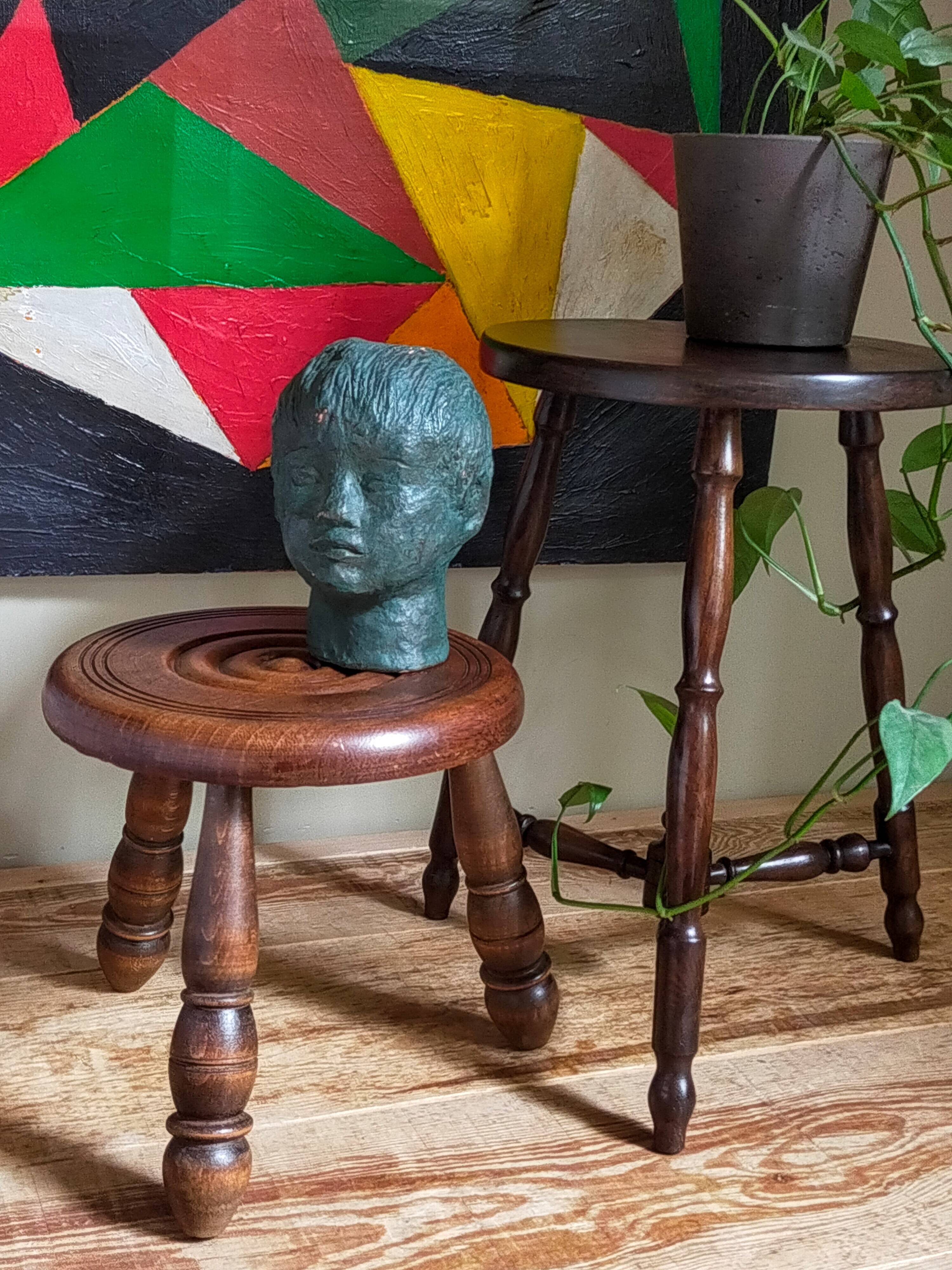 Low tripod stool in vintage turned solid wood