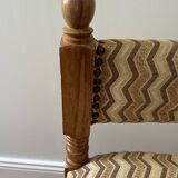 Pair of wooden chairs with herringbone fabric