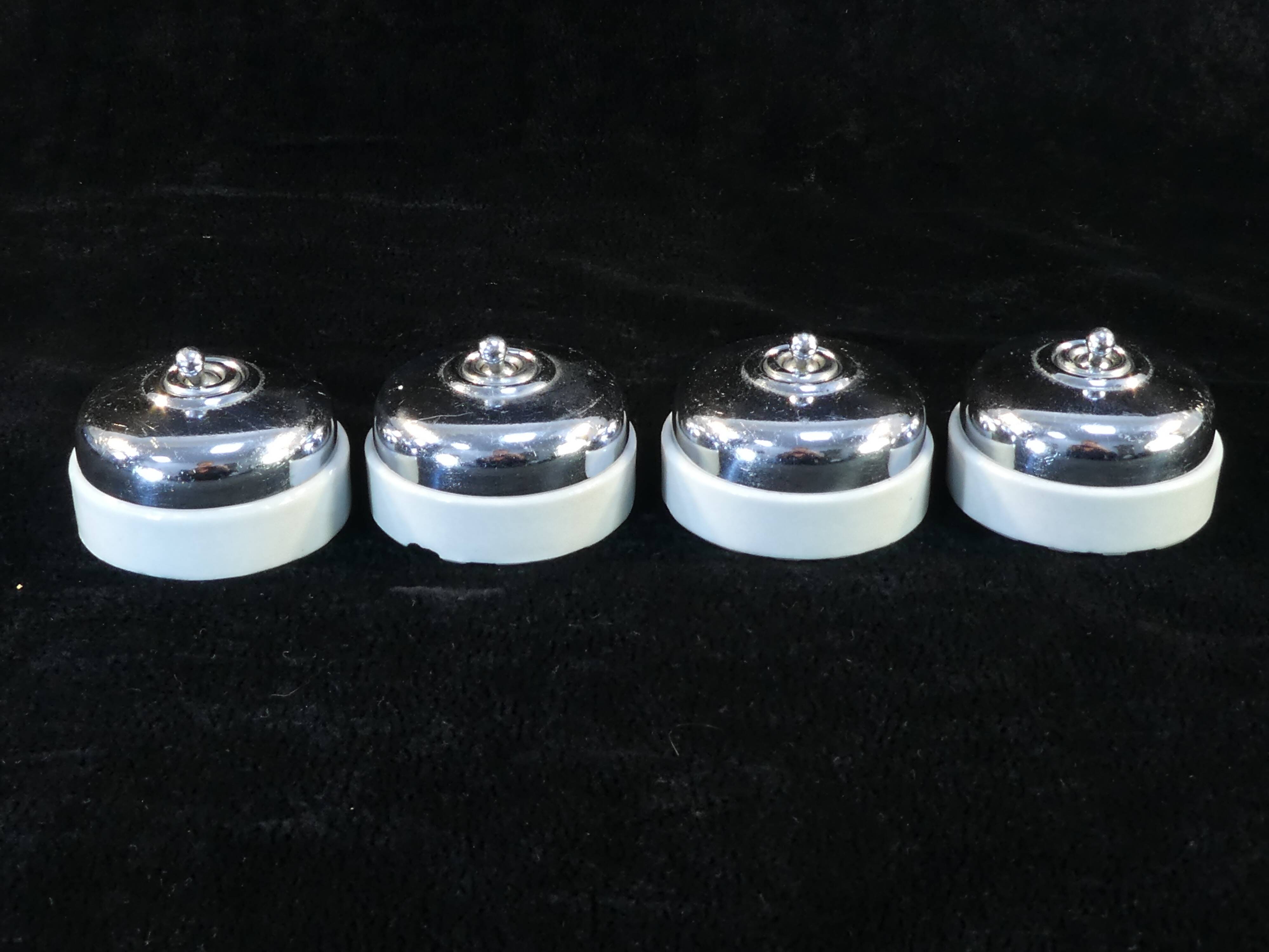 Set of 4 old porcelain and chrome switches