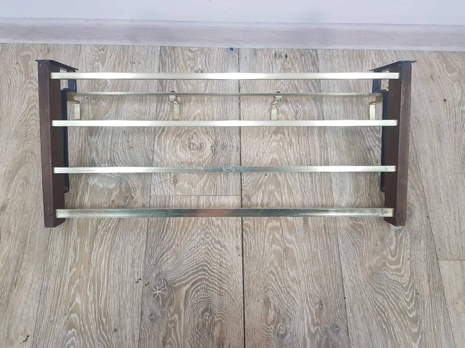 Wall-mounted coat rack, rosewood, gold-tone brass, Austria, 1960s.