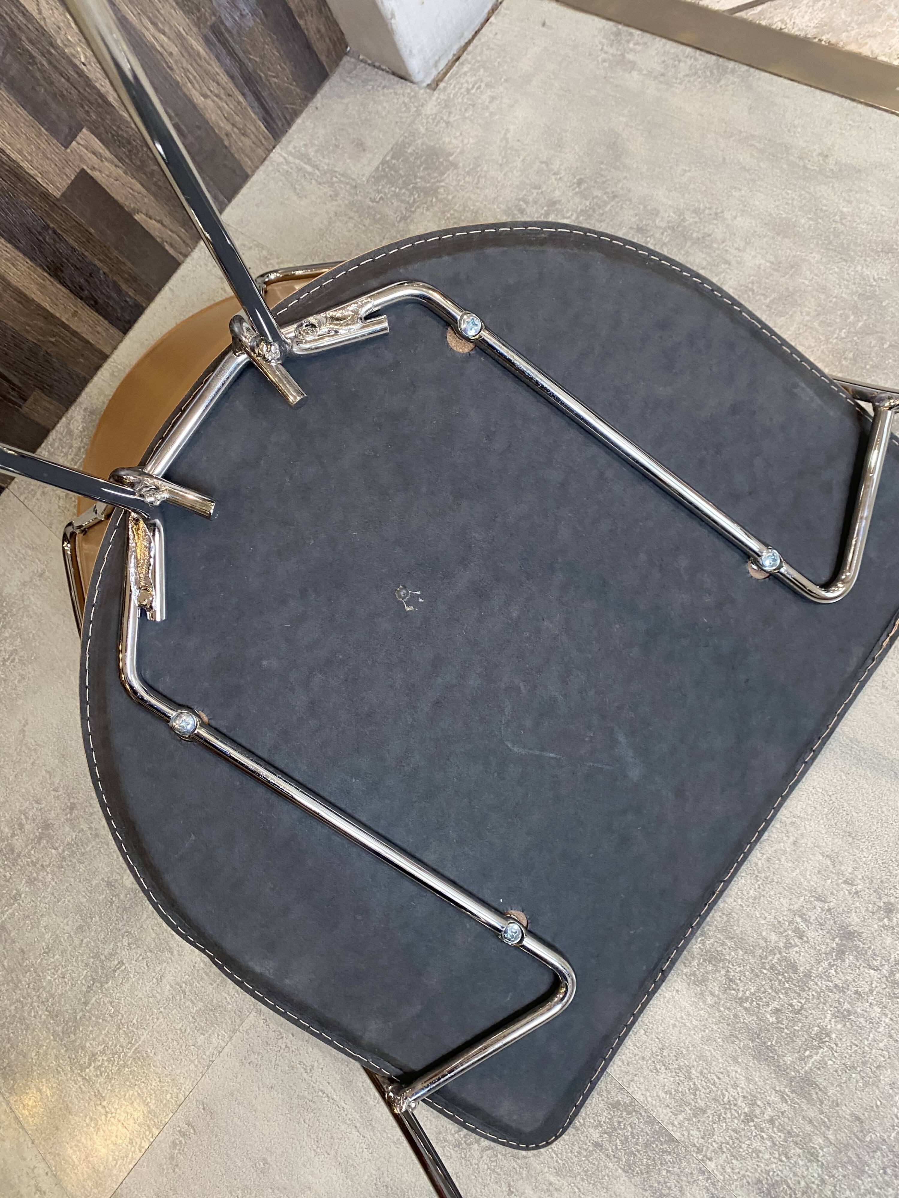 1 Linda armchair chair by Arrben in camel brown leather with a chrome steel frame.