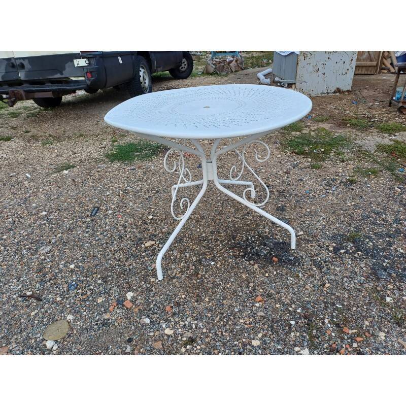 Wrought iron garden table, circa 1900