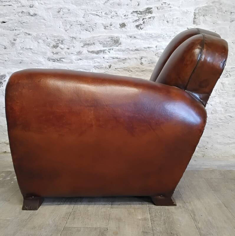 Club chair with floral backrest